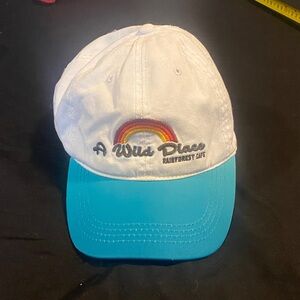 Rainforest Cafe “A Wild Place” Rainbow Dad Hat in Teal and White